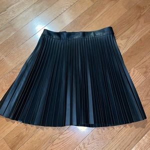 EXPRESS PLEATED SKIRT